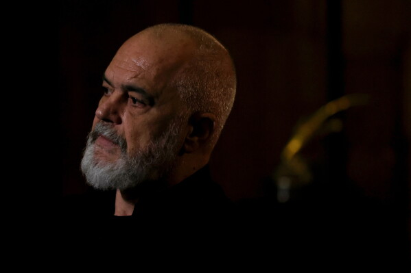 Albanian Prime Minister Edi Rama listens to a question during an interview with The Associated Press in Tirana, Albania, Tuesday, June 9, 2026. (AP Photo/Hameraldi Agolli)