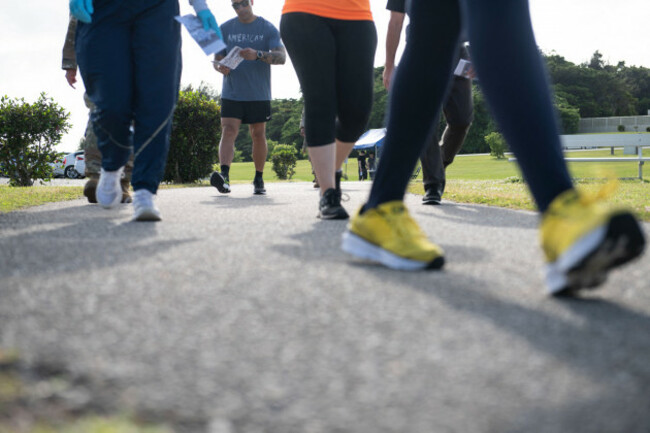 u-s-air-force-service-members-participate-in-a-silent-walk-during-days-of-remembrance-week-at-kadena-air-base-japan-april-25-2022-the-walk-was-held-as-a-symbolic-way-to-honor-those-who-suffered-a