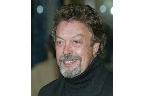 Actor Tim Curry appears at the Film Society of Lincoln Center's gala tribute to actress Susan Sarandon in New York on May 5, 2003. (AP Photo/Stuart Ramson, File)