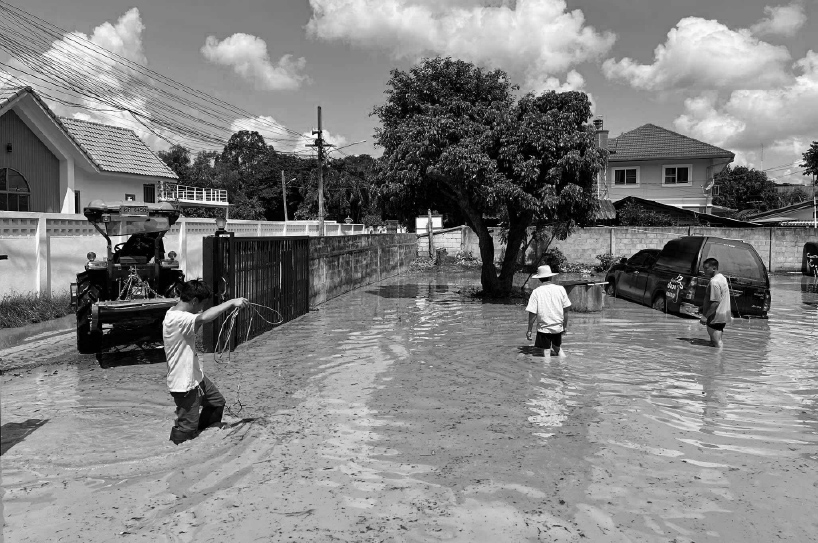 roof rain studio elevates sala kin khao open kitchen against flooding