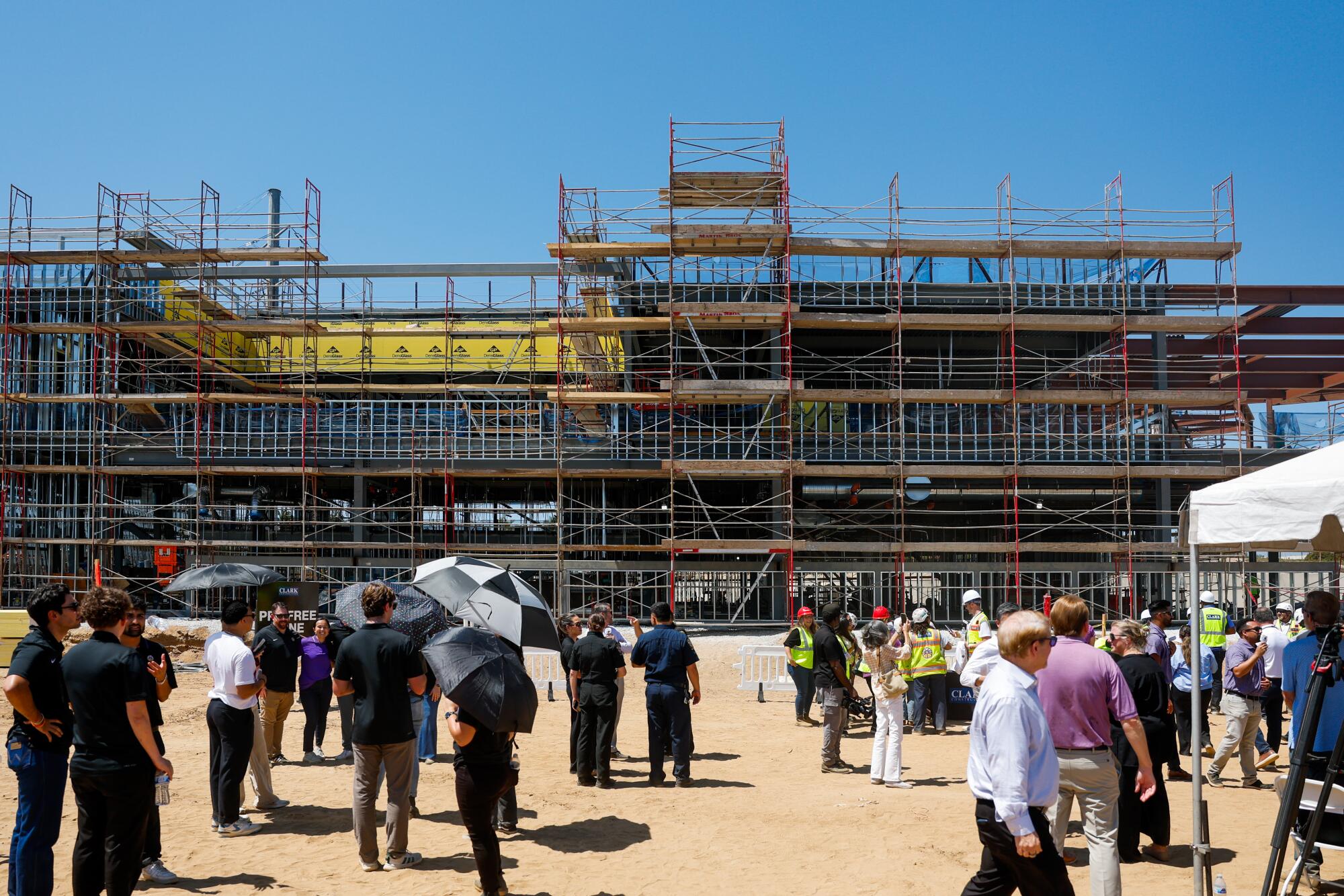 Members of the media and guests gather with the Sparks' front-office staff for the topping-out ceremony in on Wednesday.