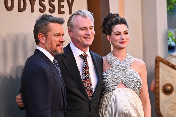 Matt Damon, from left, director Christopher Nolan, and Anne Hathaway attend the premiere of "The Odyssey" at AMC Lincoln Square on Tuesday, July 14, 2026, in New York. (Photo by Evan Agostini/Invision/AP)