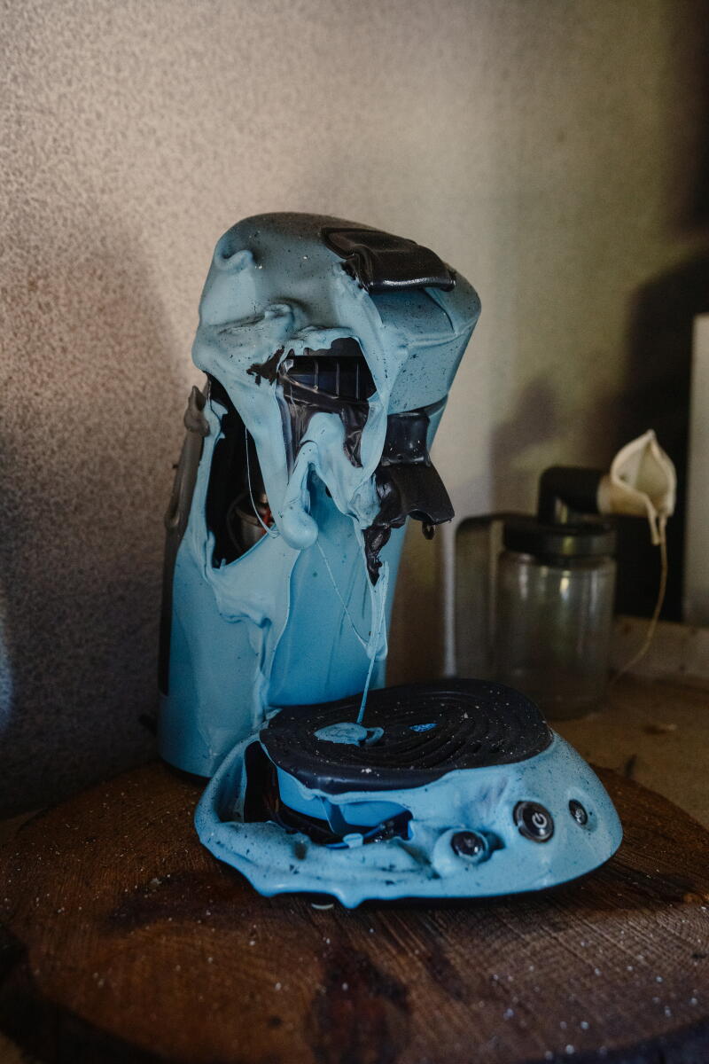 an appliance melted in the heat of an intense fire