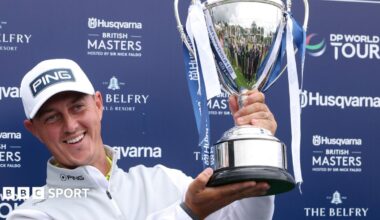 England's Joe Dean lifts the British Masters trophy
