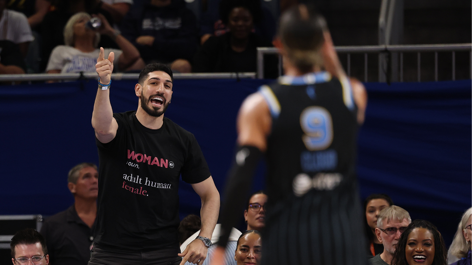 Former basketball player Enes Kanter Freedom and Natasha Cloud #9 of the Chicago Sky yell at one another during the second half between the Chicago Sky and the Indiana Fever at Wintrust Arena on August 23, 2026 in Chicago, Illinois.