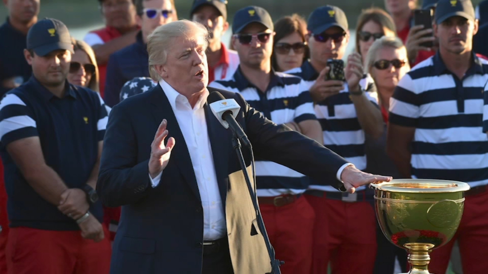President Donald Trump says he'll attend Presidents Cup golf tournament at Medinah Country Club in September