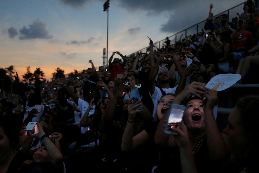 People react to the total eclipse at Southern Illinois University in Carbondale, Illinois, on August 21, 2017.