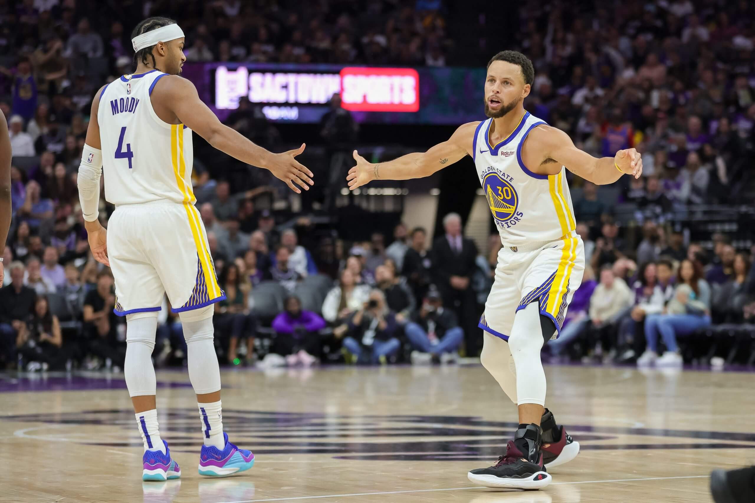 Steph Curry and Moses Moody