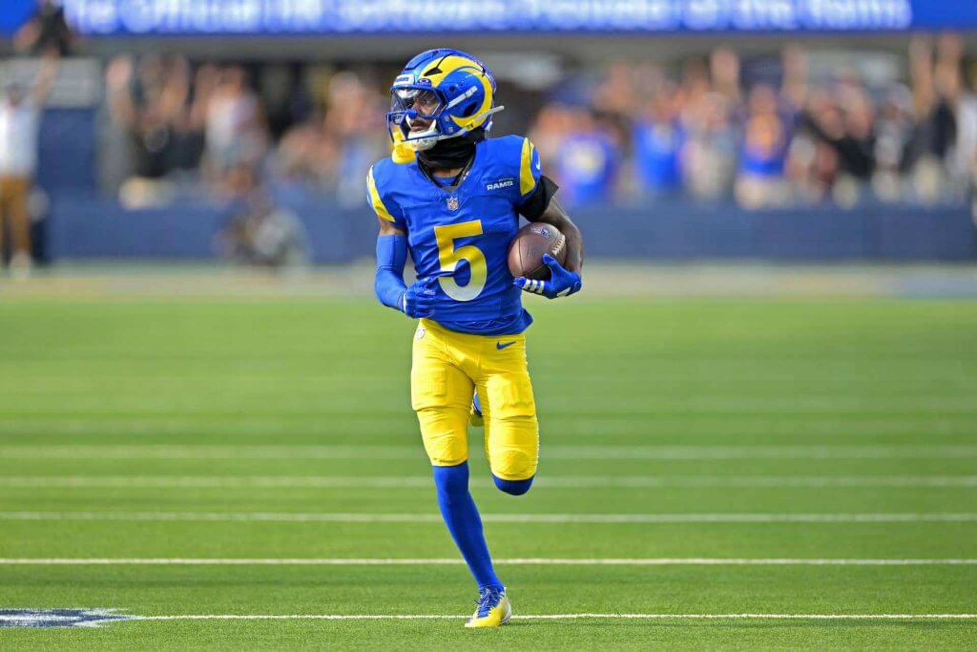 Los Angeles Rams wide receiver Tutu Atwell runs for a touchdown on an 88-yard pass in the fourth quarter against the Indianapolis Colts at SoFi Stadium.