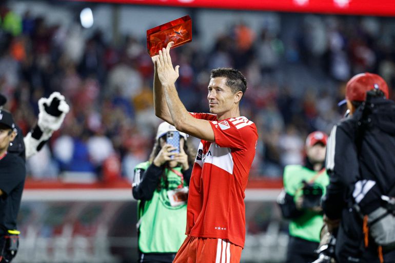 Chicago Fire forward Robert Lewandowski celebrates after his debut MLS game against Charlotte FC at Soldier Field