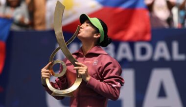Aug 3, 2026; Washington, D.C., USA; Alexandra Eala (PHI) kisses the championship trophy during the trophy ceremony after her match against Jessica Pegula (USA) (not pictured) in the women's singles final of the 2026 Mubadala DC Open at Rock Creek Park Tennis Center. Mandatory Credit: Geoff Burke-Imagn Images