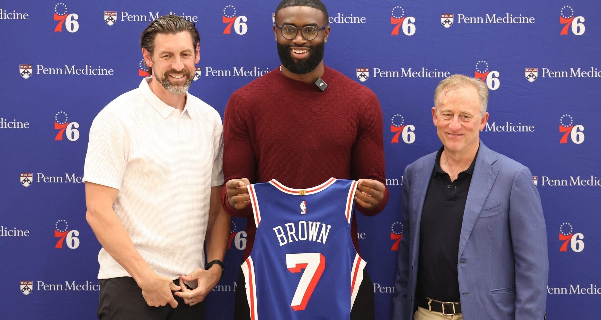 Aug 6, 2026; Camden, NJ, USA; From left to right Philadelphia 76ers general manager Mike Gansey and guard Jaylen Brown and managing partner Josh Harris pose for a photo during his introductory press conference at the Francis J. Myers Recreation Center. Mandatory Credit: Bill Streicher-Imagn Images