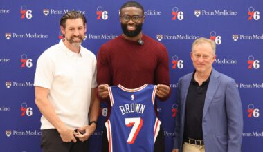 Aug 6, 2026; Camden, NJ, USA; From left to right Philadelphia 76ers general manager Mike Gansey and guard Jaylen Brown and managing partner Josh Harris pose for a photo during his introductory press conference at the Francis J. Myers Recreation Center. Mandatory Credit: Bill Streicher-Imagn Images