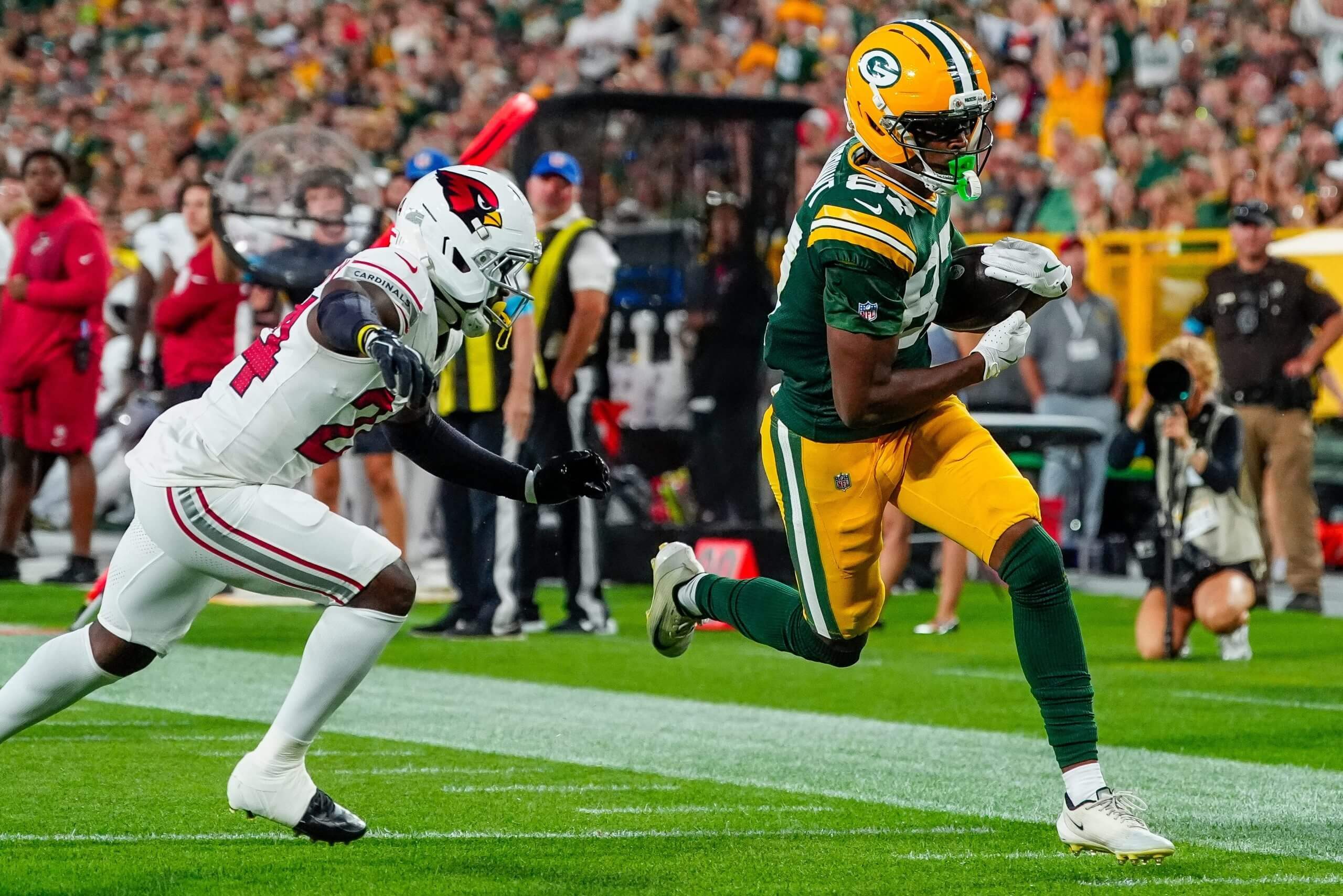 Green Bay Packers wide receiver J. Michael Sturdivant (87) scores a touchdown against the Arizona Cardinals during their preseason football game on Friday, Aug. 28, 2026, at Lambeau Field in Green Bay, Wisconsin.