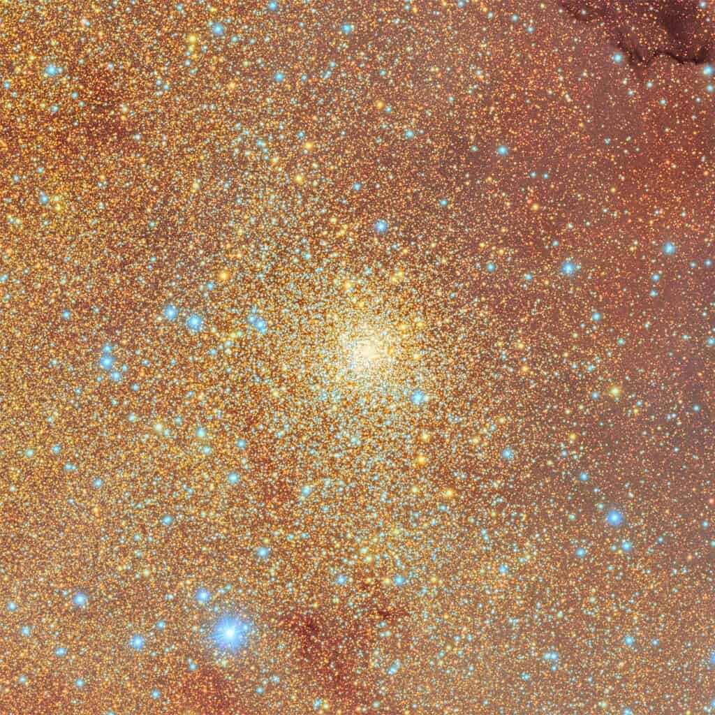 Sky image densely populated with bright yellow and blue stars. Vera Rubin Observatory Photo.