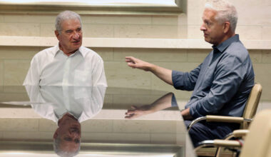 Tony Marnell, left, founder and Chairman Emeritus of Marnell Companies, listens as David Howryl ...