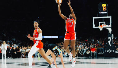 Aces center A'ja Wilson (22) looks to see if a referee will call a foul as New York Libert ...