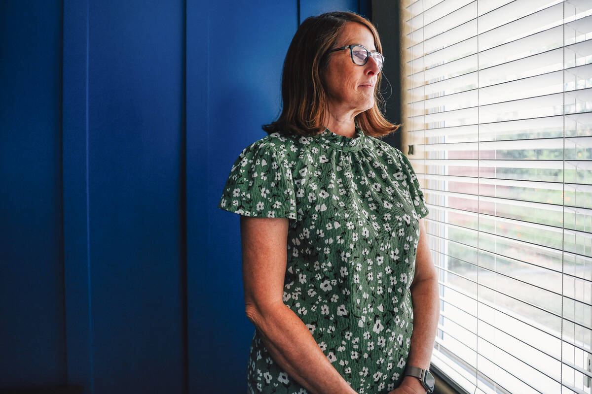 Jennifer Hiller, an English teacher at Arbor View High School, poses for a portrait at her home ...