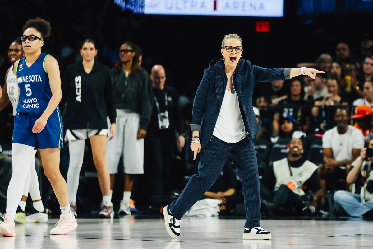 Aces head coach Becky Hammon yells at a referee before challenging a call during a WNBA basketb ...