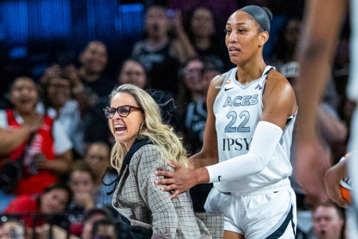 Aces head coach Becky Hammon rages on the court after a no-foul call on center A'ja Wilson (22) ...