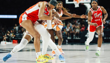 Connecticut Sun guard Kennedy Burke (25) tries to steal the ball from Aces center A'ja Wil ...
