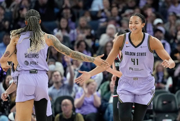 SAN FRANCISCO, CALIFORNIA - JUNE 02: Kiah Stokes #41 of the Golden State Valkyries is congratulated by Gabby Williams #1 after making a three-point shot against the Portland Fire in the second half during a WNBA Commissioner's Cup game at Chase Center on June 2, 2026 in San Francisco, California. (Photo by Thearon W. Henderson/Getty Images)