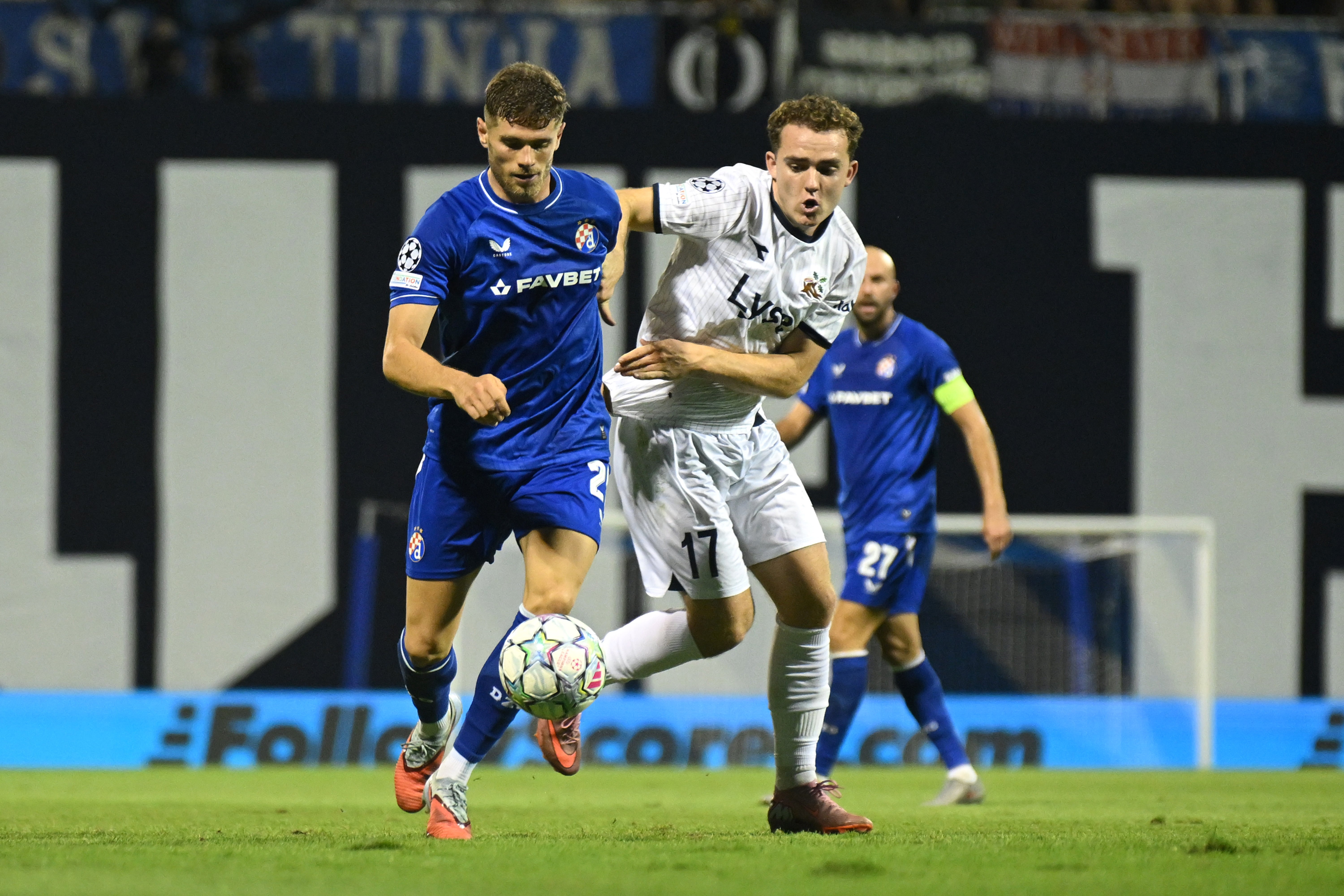 Moris Valincic of GNK Dinamo is challenged by Edwin Austbo of Viking