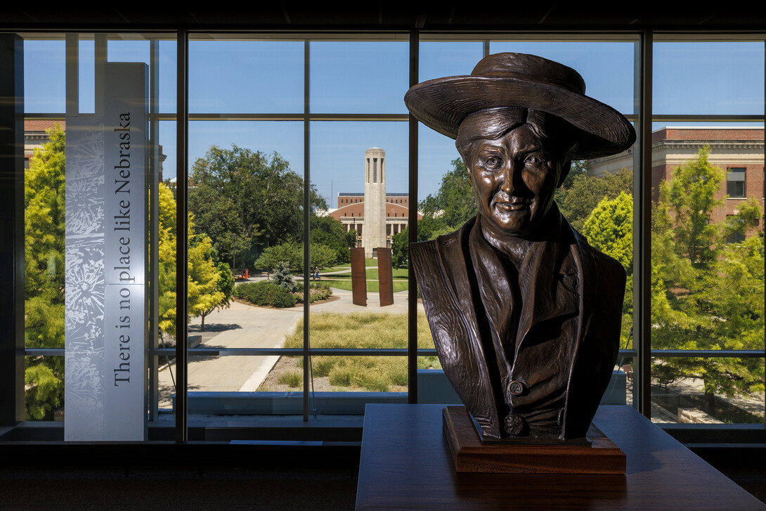A bust of Willa Cather looks out over the Love Library North study area. The bust is a first edition casting taken from the original sculpture by Littleton Alston that resides in Statuary Hall of the United States Capitol.