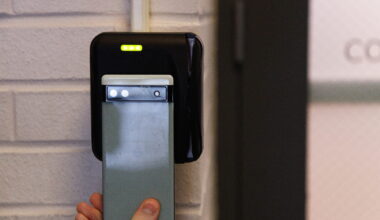 A student uses their digital BuckID to unlock a door on campus (Posed). Credit: Michael Goulet