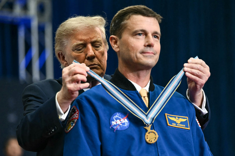Pesident Donald Trump presents a Congressional Space Medal of Honor to NASA astronaut and commander Reid Wiseman