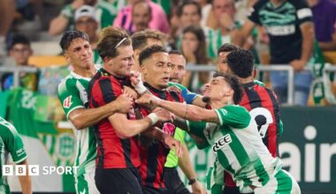 Antony of Real Betis fights with Alex Scott of AFC Bournemouth during the pre-season friendly