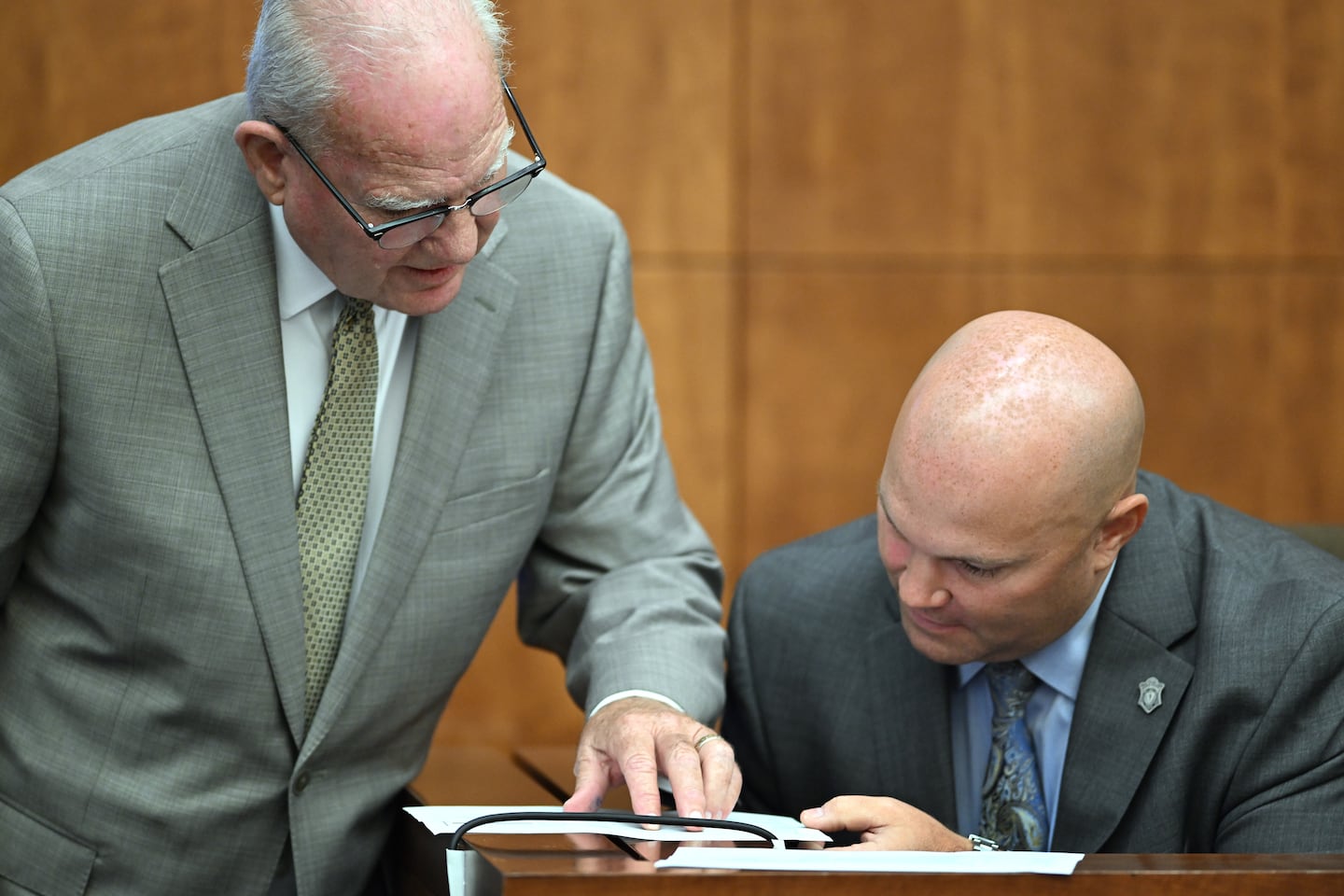From left, Kevin Reddington, lawyer for Lindsay Clancy, and Massachusetts State Police Trooper Kyle Pavao look at internet search records during Pavao's testimony in the murder trial of Lindsay Clancy, Thursday, Aug. 13, 2026., in Plymouth, Mass.  