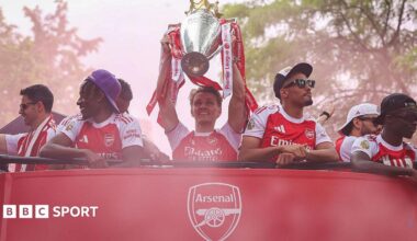 Arsenal players celebrate the Premier League title win
