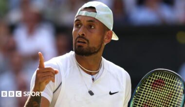 Nick Kyrgios gestures after a point in the Wimbledon men's singles final in 2022