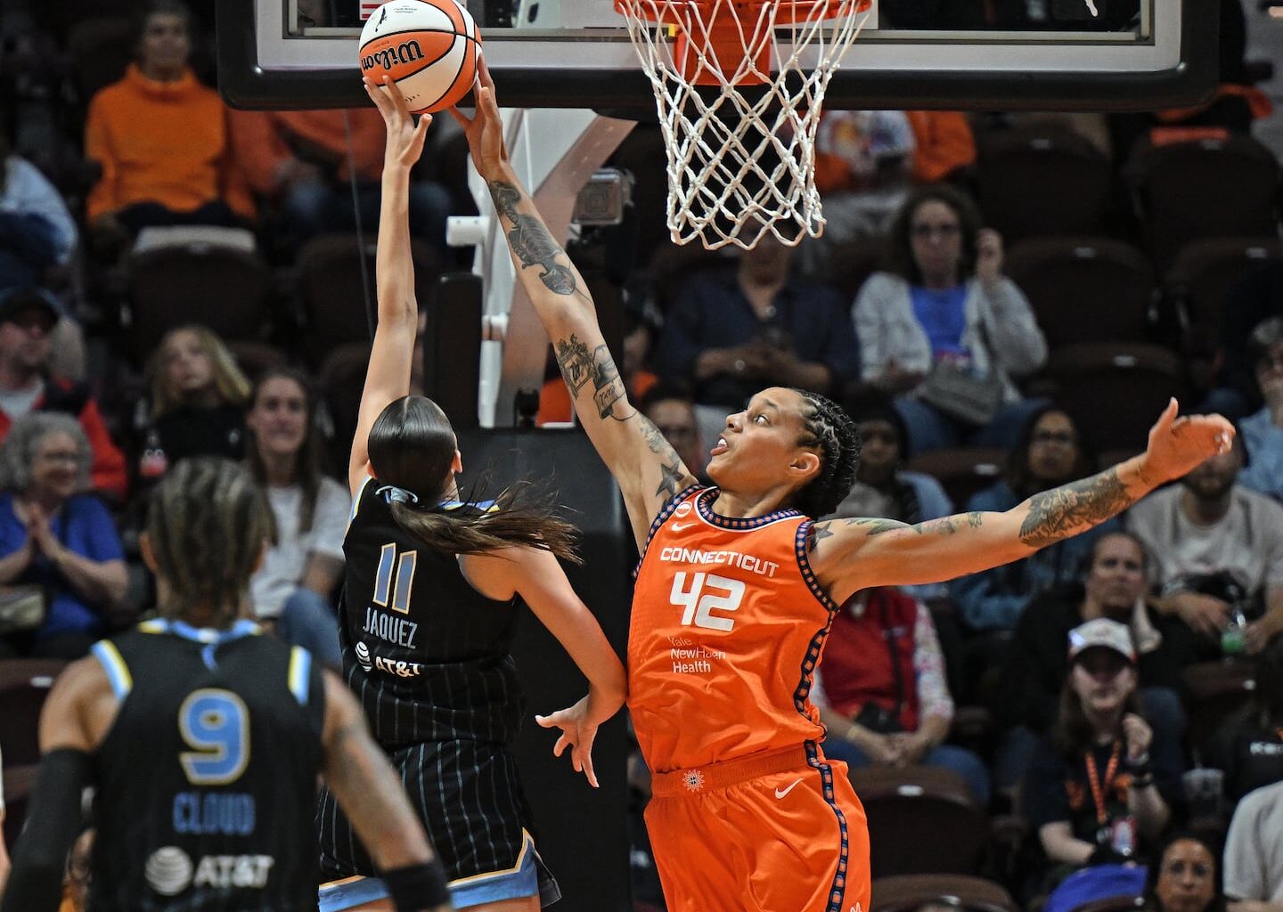 Sun center Brittney Griner (right), shown in action earlier this season, snuffed Phoenix's Kelsey Plum on a go-ahead 3-point attempt with one second left to give Connecticut a big victory Friday in Uncasville, Conn.
