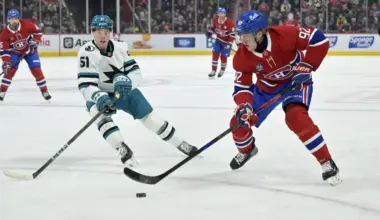 Montreal Canadiens forward Patrik Laine (92) plays the puck and San Jose Sharks forward Collin Graf (51) defends during the second period at the Bell Centre.