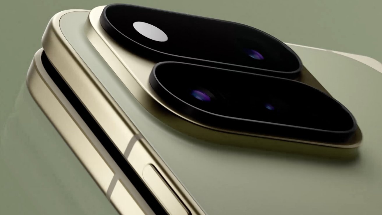 Close-up of a modern smartphone's dual rear camera module with two large black lenses and metallic gold edges on a sleek, light green body