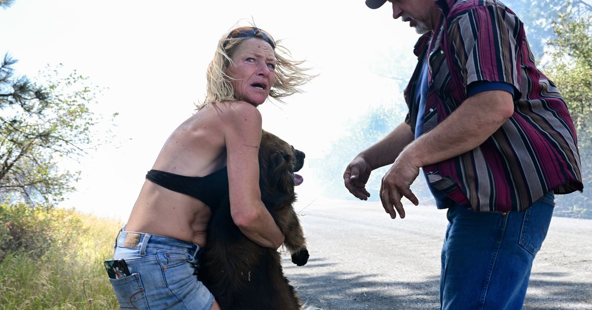 'When the sun rises, we are going to be in shock': Thousands evacuated in north Spokane as wildfire crosses river into city