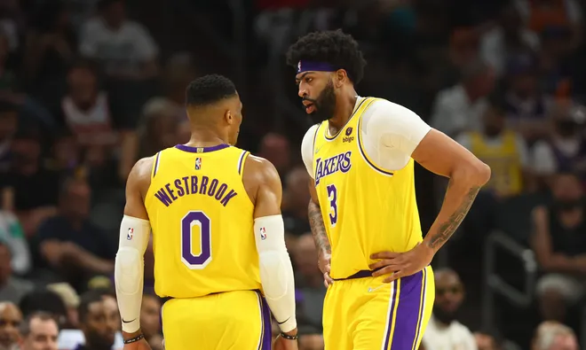 Apr 5, 2022; Phoenix, Arizona, USA; Los Angeles Lakers forward Anthony Davis (3) talks to guard Russell Westbrook (0) against the Phoenix Suns at Footprint Center. Mandatory Credit: Mark J. Rebilas-USA TODAY Sports
