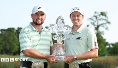 Alex and Matt Fitzpatrick pose with the trophy after winning the Zurich Classic on the PGA Tour in April 2026