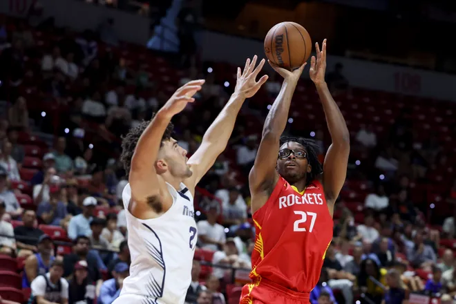LAS VEGAS, NEVADA - JULY 18: Isaiah Crawford #27 of the Houston Rockets shoots against Cameron Boozer #27 of the Memphis Grizzlies in the first half of a 2026 NBA Summer League semifinal game at the Thomas & Mack Center on July 18, 2026 in Las Vegas, Nevada. NOTE TO USER: User expressly acknowledges and agrees that, by downloading and or using this photograph, User is consenting to the terms and conditions of the Getty Images License Agreement. (Photo by Ian Maule/Getty Images)