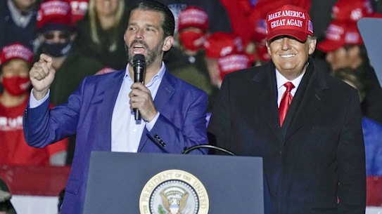 Donald Trump Jr with his father.