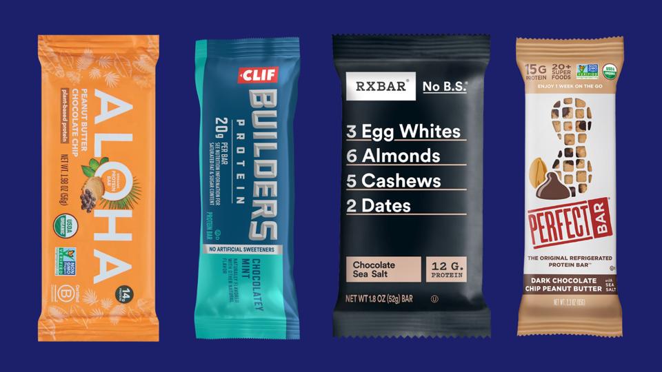 Four protein bars against a dark blue background.