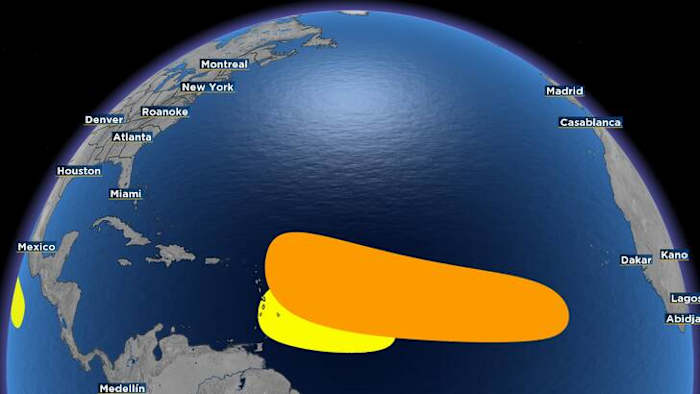 Tropics remain active as one of the two spots becomes less organized