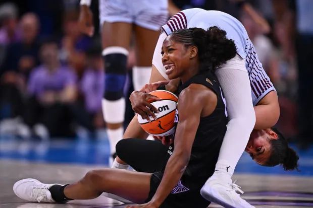 Golden State Valkyries' Kaila Charles (6) battles Toronto Tempo's Kia Nurse (11) for a loose ball in the second half of their WNBA game at Chase Center in San Francisco, Calif., on Sunday, Aug. 2, 2026. The Golden State Valkyries defeated the Toronto Tempo 96-79. (Jose Carlos Fajardo/Bay Area News Group)