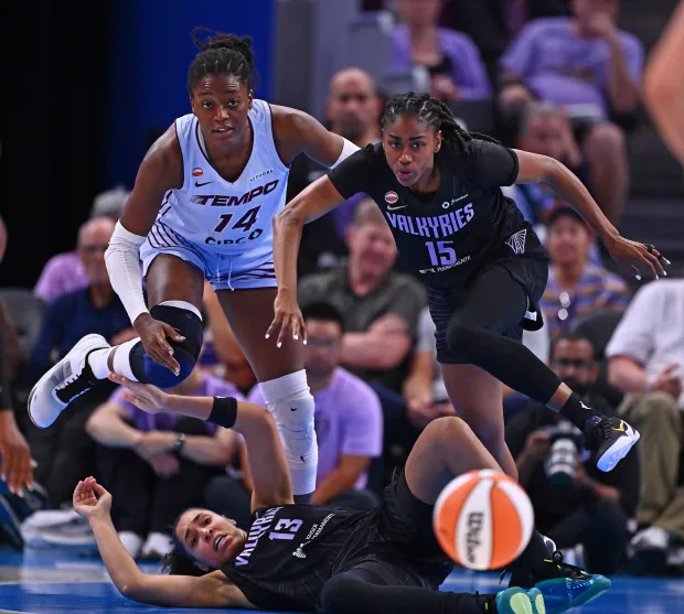 Toronto Tempo's Temi Fagbenle (14) battles Golden State Valkyries' Janelle Salaun (13) and Tiffany Hayes (15) for a loose ball in the second half of their WNBA game at Chase Center in San Francisco, Calif., on Sunday, Aug. 2, 2026. The Golden State Valkyries defeated the Toronto Tempo 96-79. (Jose Carlos Fajardo/Bay Area News Group)
