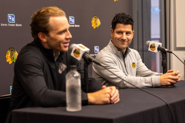 Patrick Kane and team Blackhawks general manager Kyle Davidson speak to assembled media at the Chicago Blackhawks Ice Center on July 24, 2026. (Arthur Maiorella/Chicago Tribune)