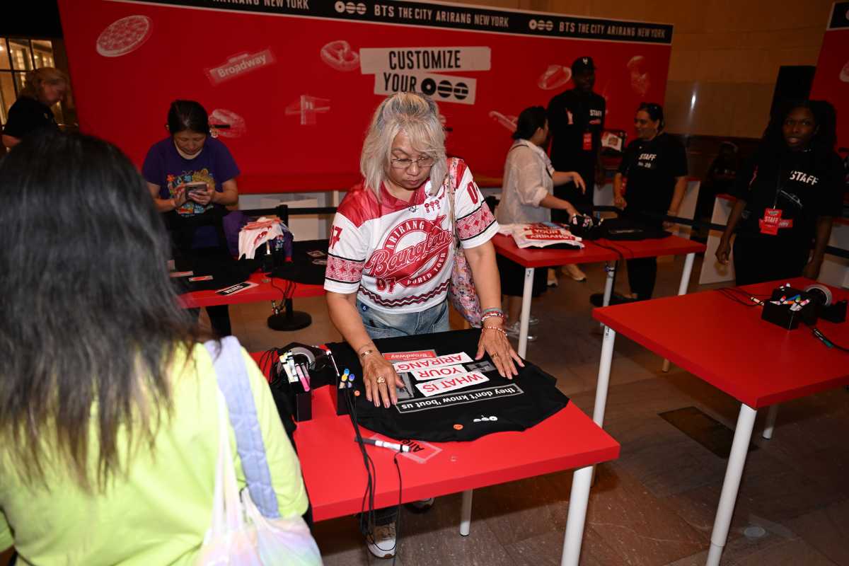 At Grand Central Terminal, fans were able to customize their own BTS-themed t-shirts.