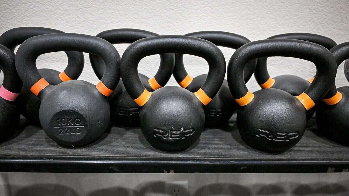 Dozens of kettlebells of different weights line the wall at Reach Fitness Studio, a new gym opening in a Clovis commercial business space. The gym specializing in kettlebell training, mainly for women, and taught by a former Fresno State cheerleader who's since become a fitness guru.