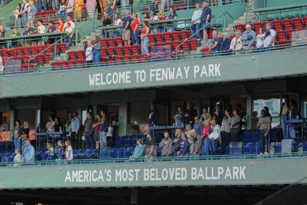 Fans stand for the national anthem at Fenway Park in 2025. (Robert F. Bukaty/AP)